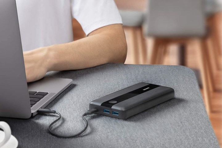The Anker PowerCore III connected to laptop.