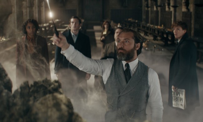 Jude Law and the cast of Fantastic Beasts: The secrets of Dumbledore gather in a cave.