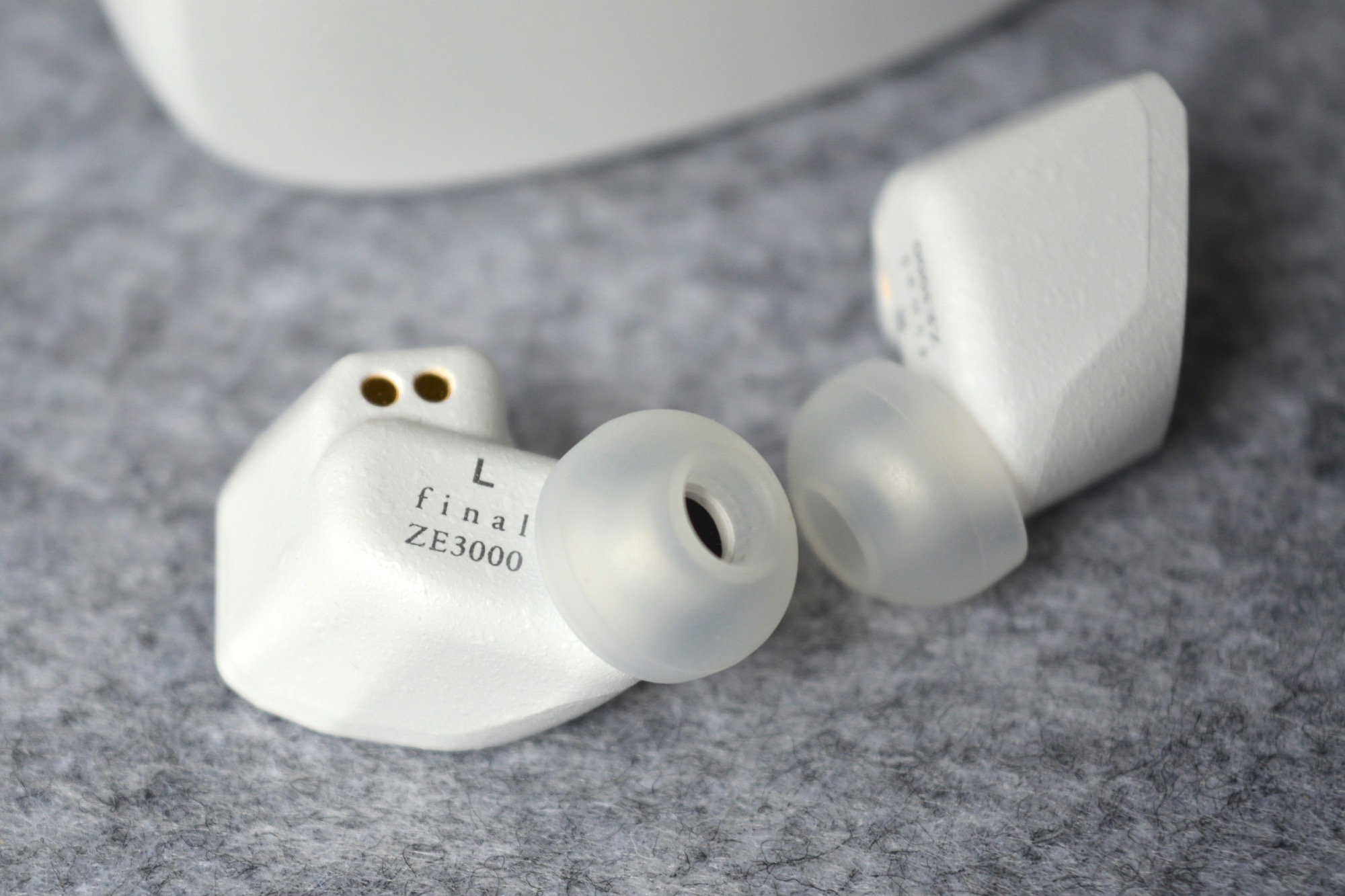 Close-up of the Final Audio ZE3000 wireless earbuds.