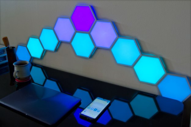 Govee Hexa Glide Light Panels installed on wall behind desk.