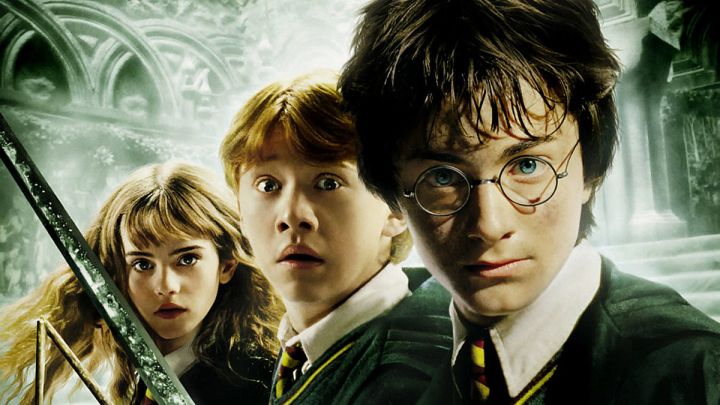 Hermione, Ron, and Harry on the poster for HP and the Chamber of Secrets