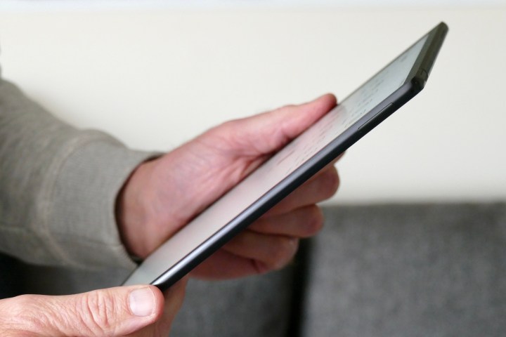 Side view of the Huawei MatePad Paper held in hand.