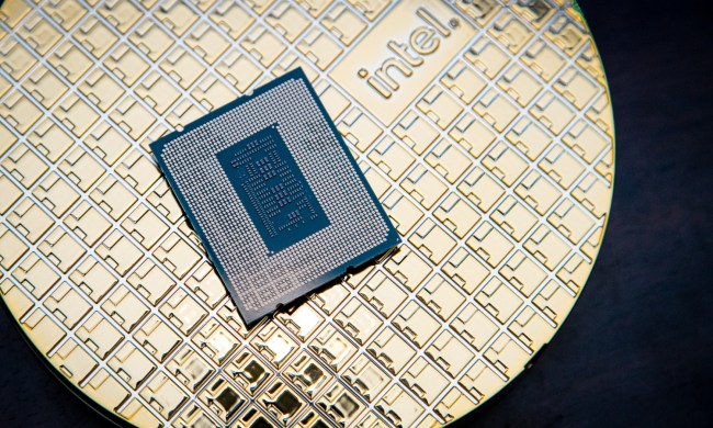 A Core i9-12900KS processor sits on its box.