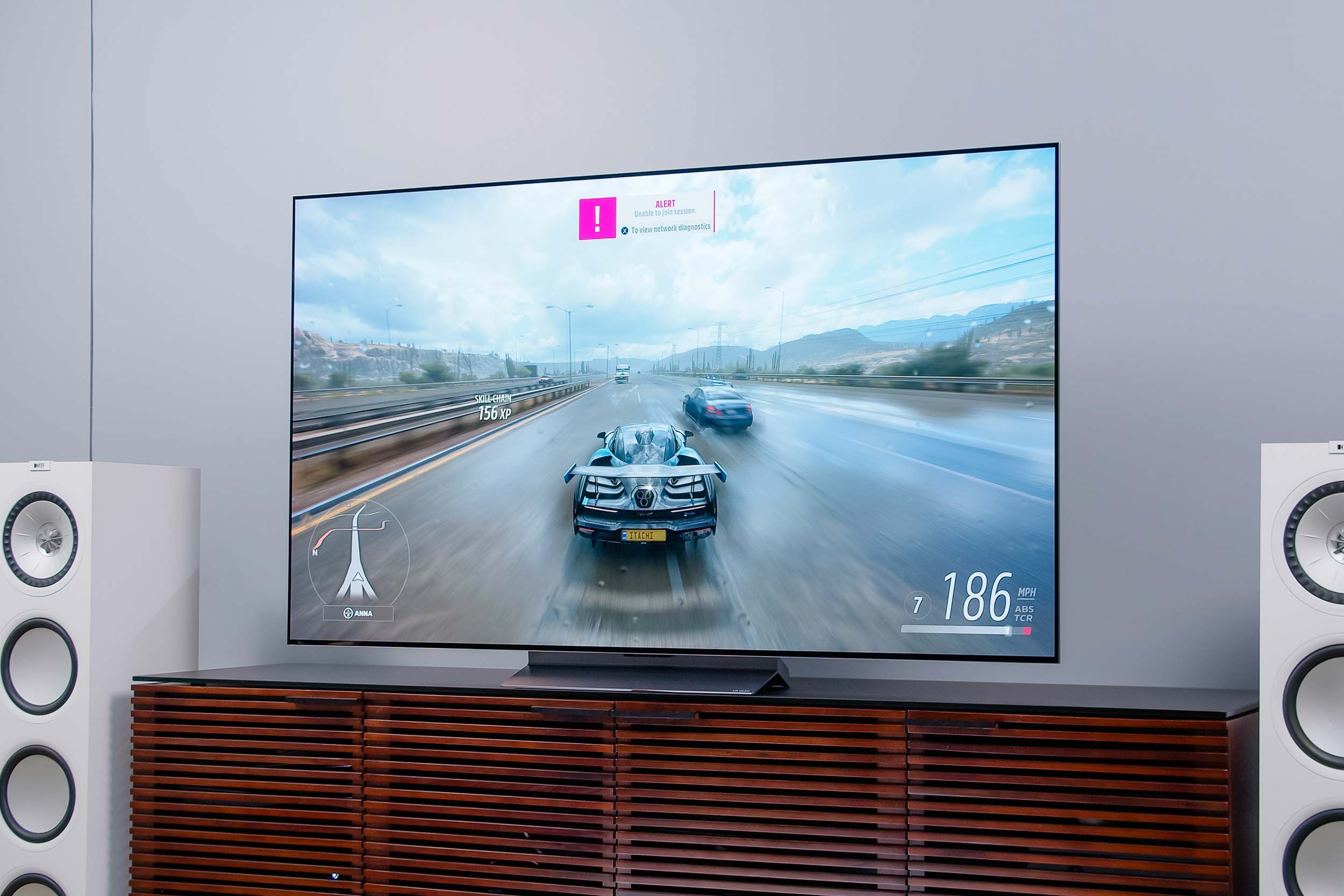 A racing video game being played on the LG C2 OLED TV.