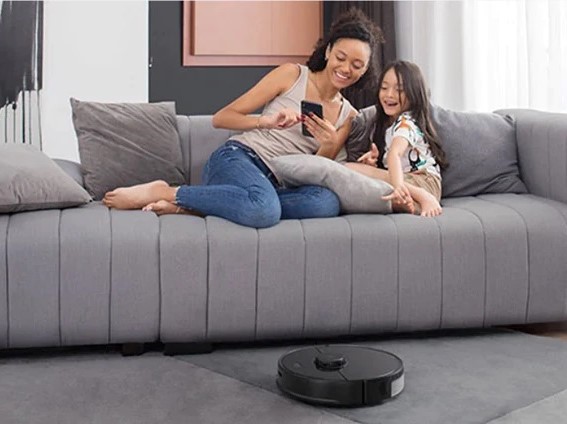 Mother and daughter with Roborock S5 Max smart vacuum.