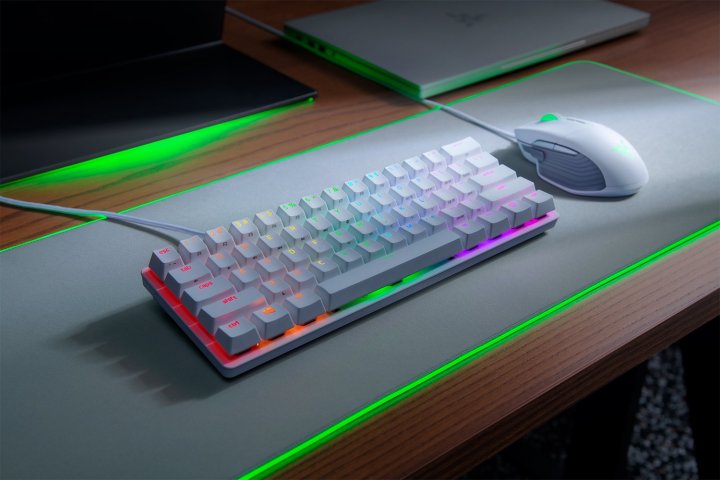 Razer Huntsman Mini 60-percent keyboard in mercury white on light gray deskpad.