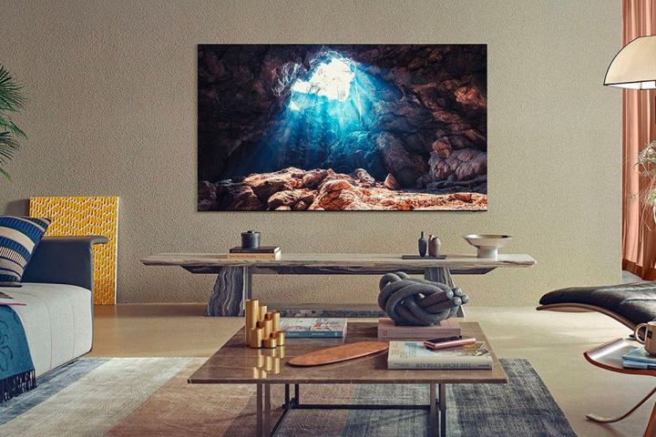 A Samsung 85-inch 8K hangs on a living room wall.