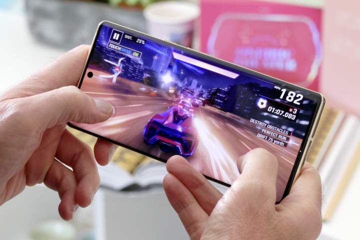 Man playing a game on the Google Pixel 6 Pro.