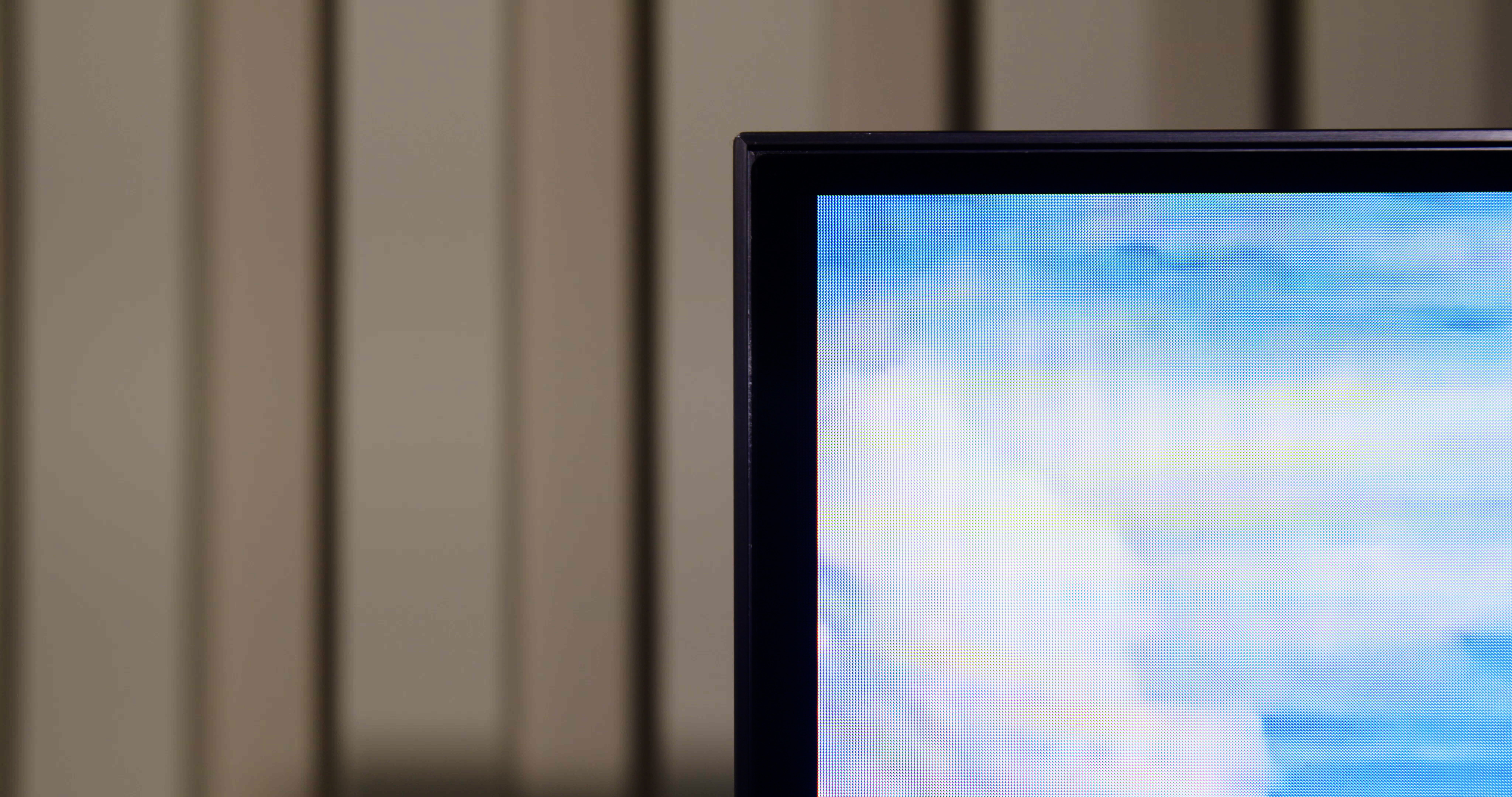 Close-up view of Samsung S95B OLED TV bezel around screen.