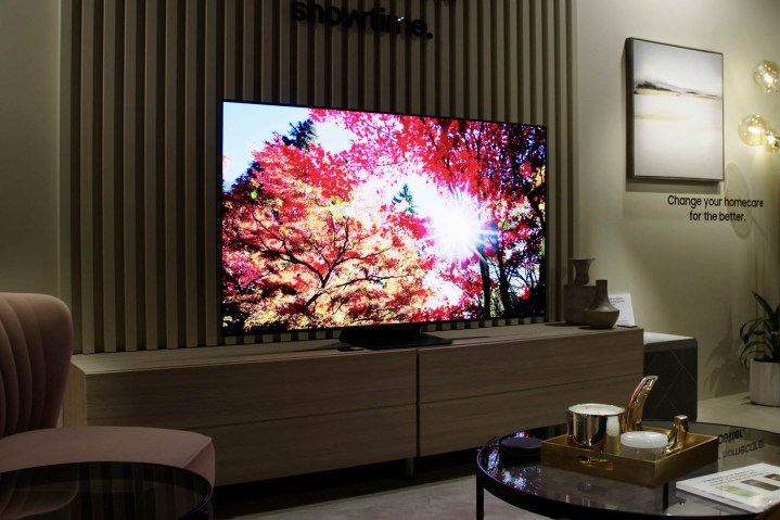 Samsung S95B OLED TV with ablaze angel on-screen.