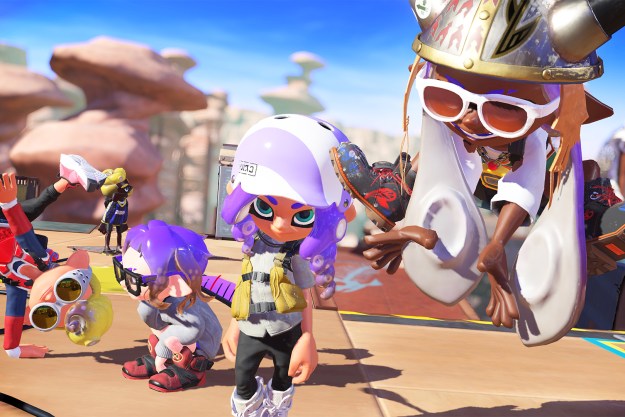 Four Splatoon 3 inklings standing together.