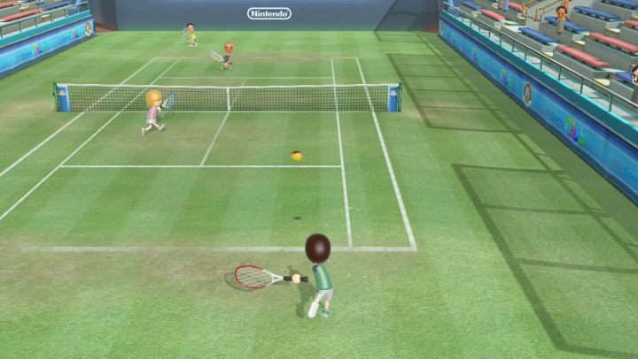 Four people play Tennis in Wii Sports Club