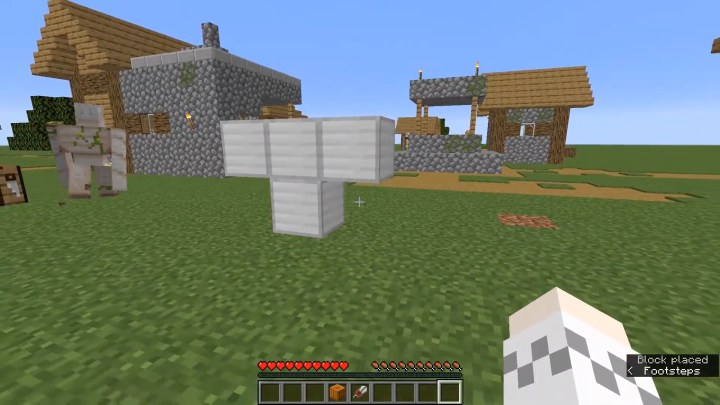 Costruire un golem di ferro in un villaggio.