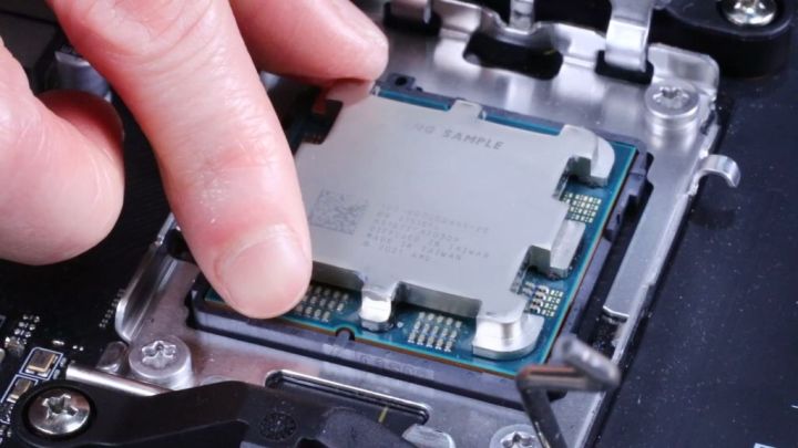 AMD Ryzen 7000 processor being installed inside a MSI motherboard.