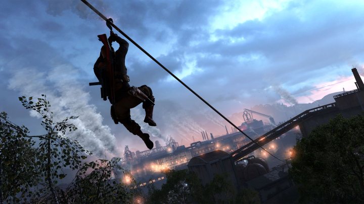 Karl Fairburne on a zipline in Sniper Elite 5.