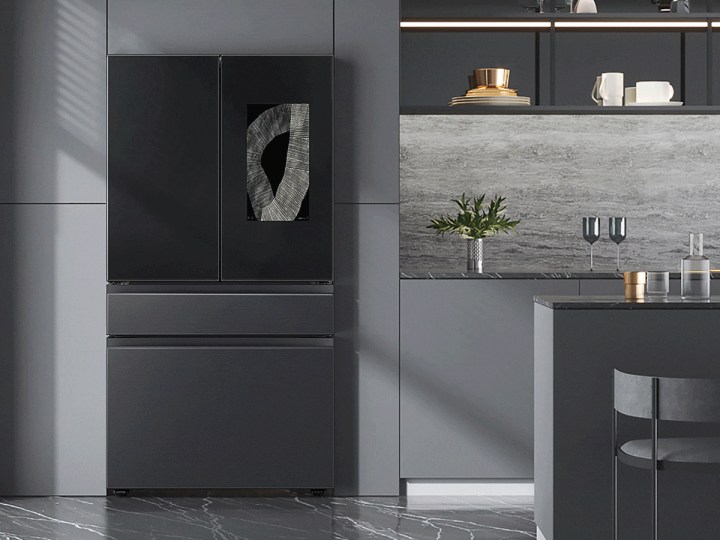 Samsung Bespoke 4-door French door Family Hub refrigerator in a dark-gray kitchen.