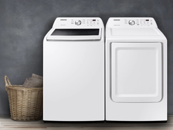 Samsung top load washer and dryer set in white against a taupe background.