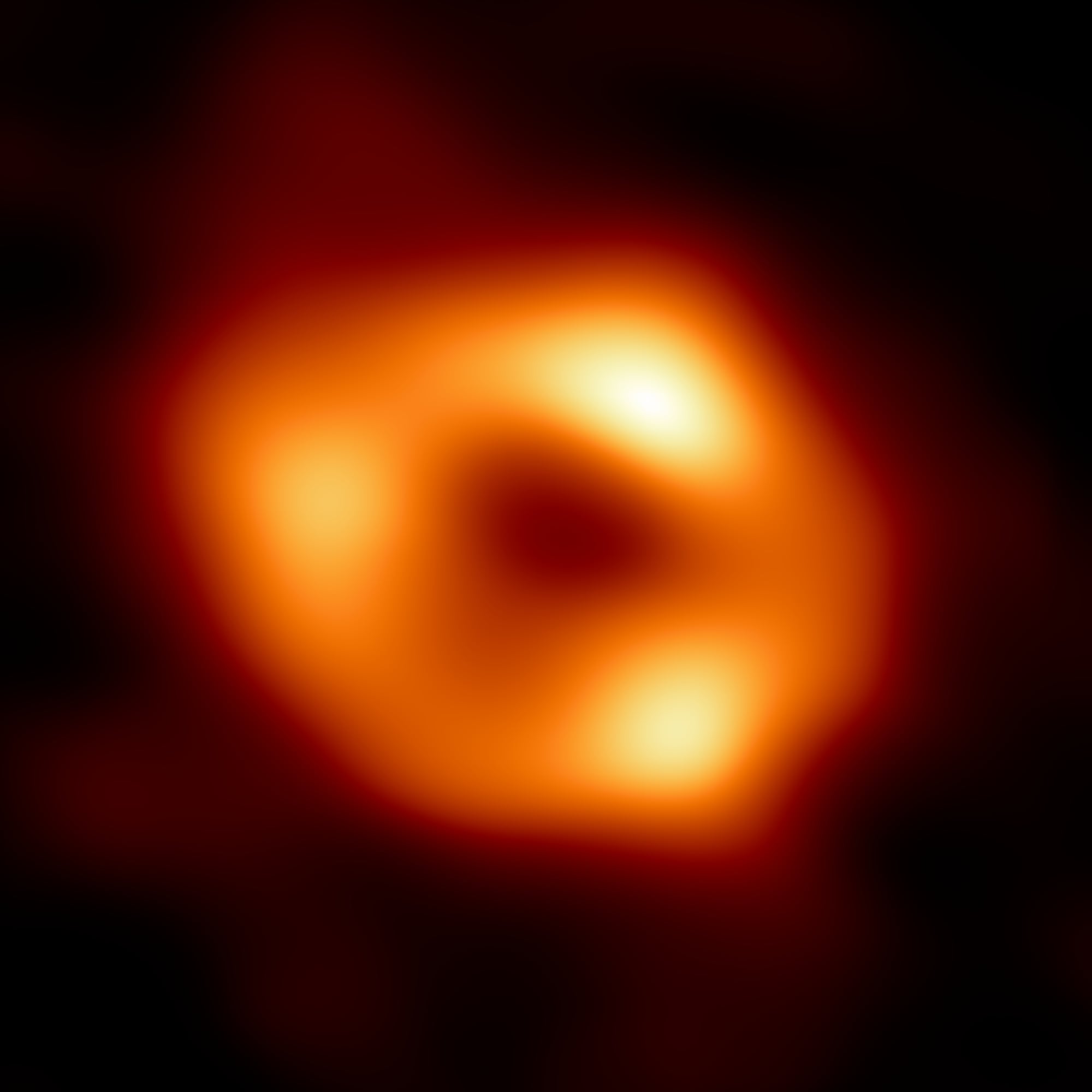 Bubble of gas zips around galaxy's supermassive black hole