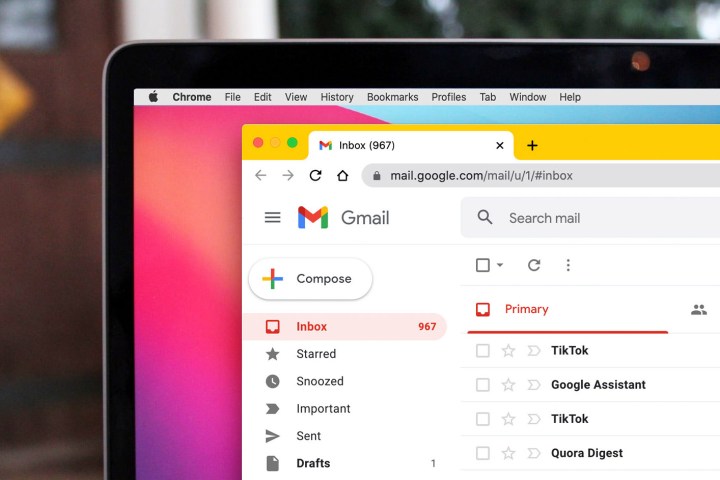 A Macbook with Google Chrome opened to a Gmail inbox.