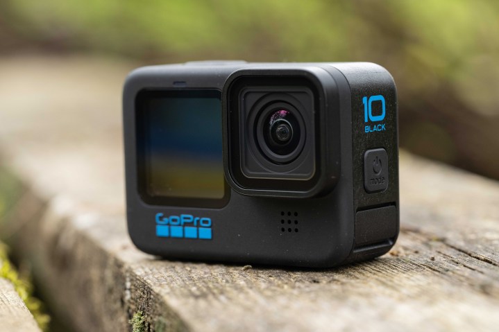 The GoPro Hero 10 Black on a plank of wood.