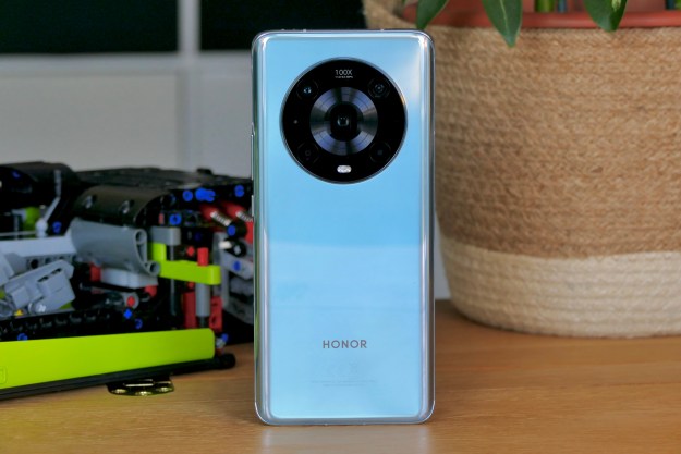 Honor Magic4 Pro seen from the back, in its cyan color.