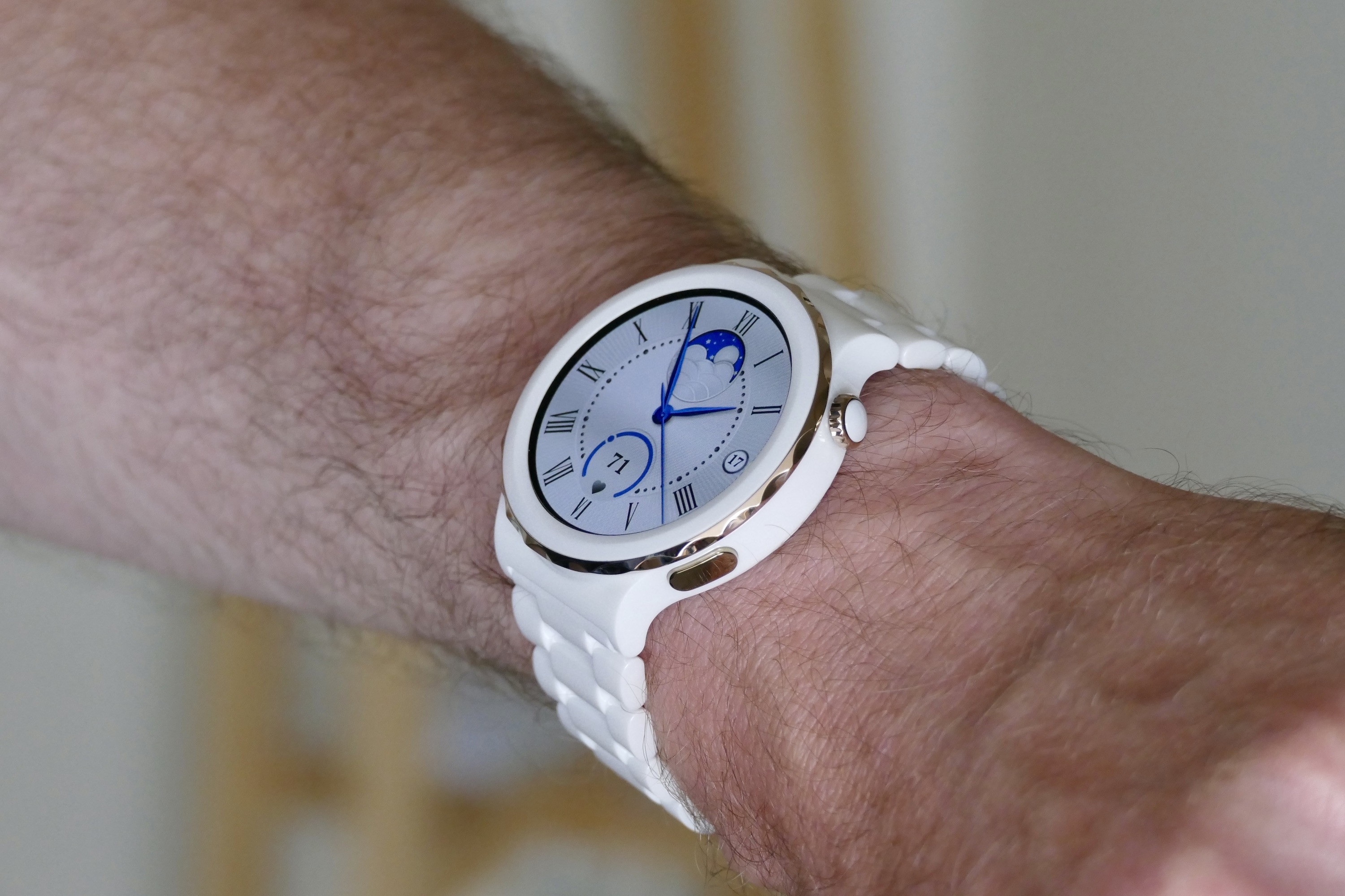 The Huawei Watch GT 3 Pro Ceramic's screen on a wrist.