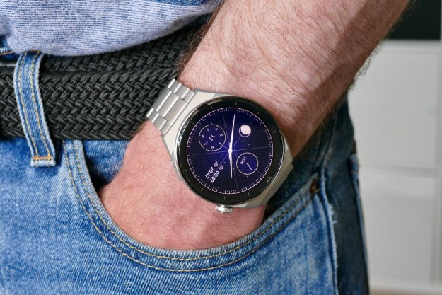 Huawei Watch GT 3 Pro on man's wrist in pocket.