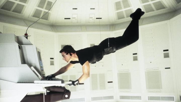 Tom Cruise stars in Mission: Impossible (1996).