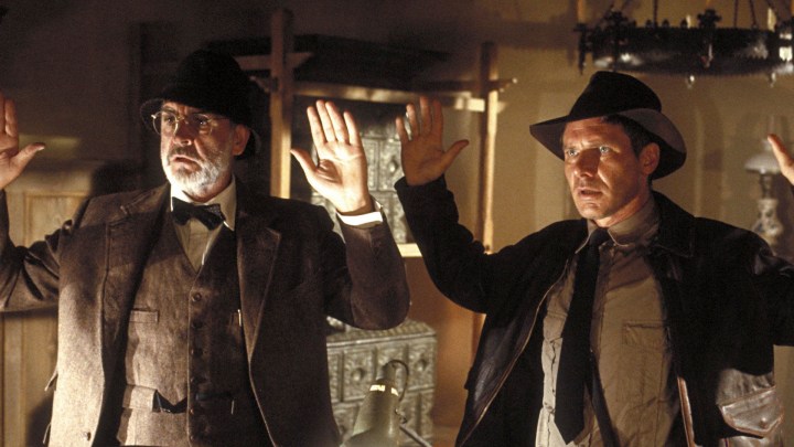Sean Connery and Harrison Ford put their hands up in Last Crusade.