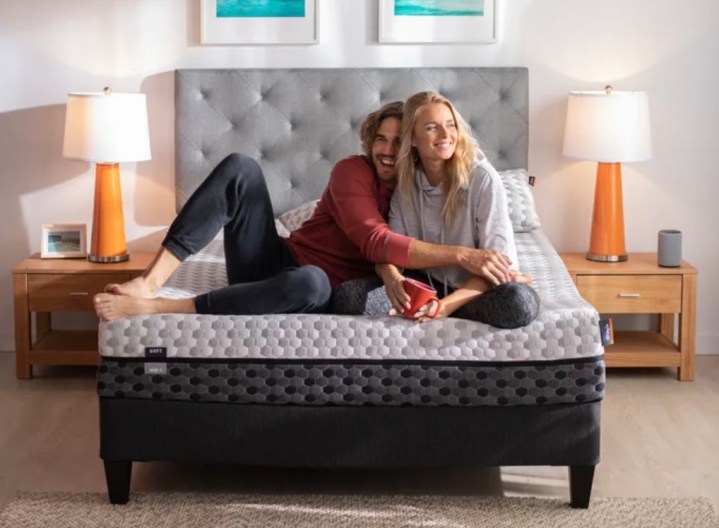 This image is of a couple on a cozy Layla mattress.
