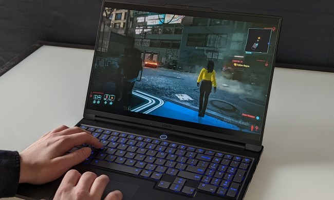 Playing a game on the Lenovo Legion Slim 7i gaming laptop.