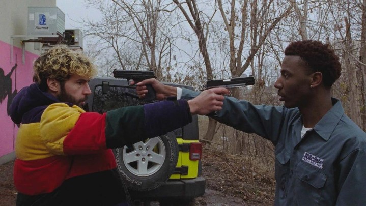 Two men point guns at each other in On the Count of Three.