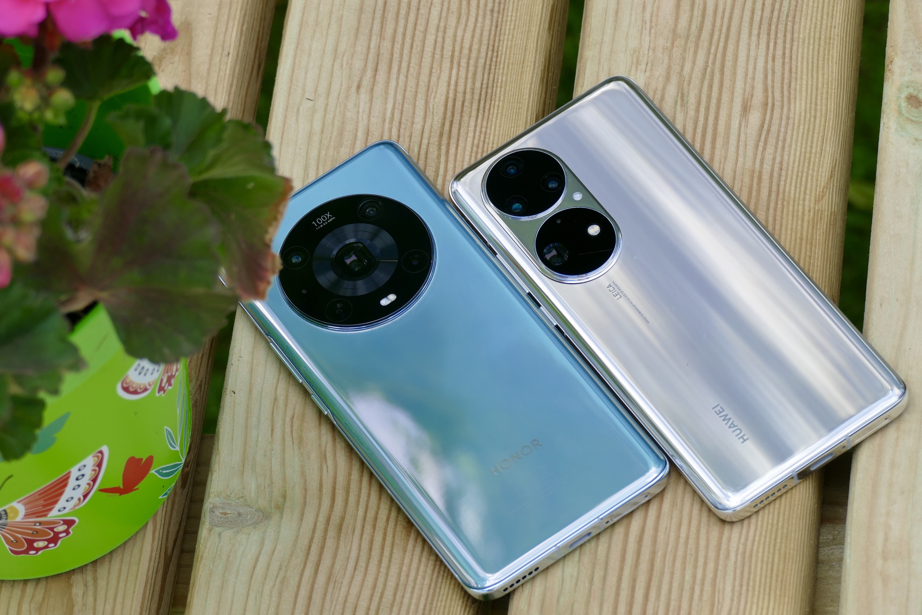 Huawei P50 Pro and Honor Magic4 Pro seen from the back.