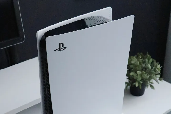 The Playstation 5 system standing upright. standing upright.