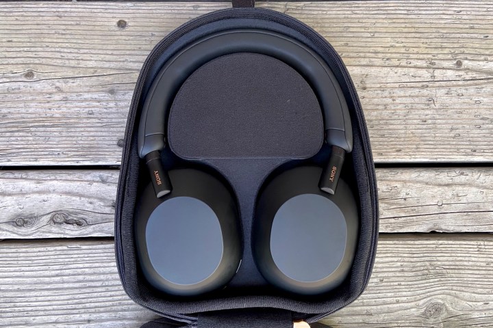 Sony WH-1000XM5 wireless headphones in travel case.