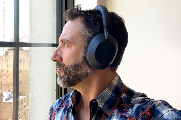 A man wearing the Sony WH-1000XM5.