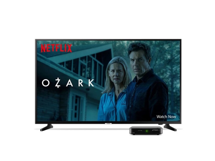 Telus Optik TV PVR box sits next to a TV with Netflix and Ozark on the display.