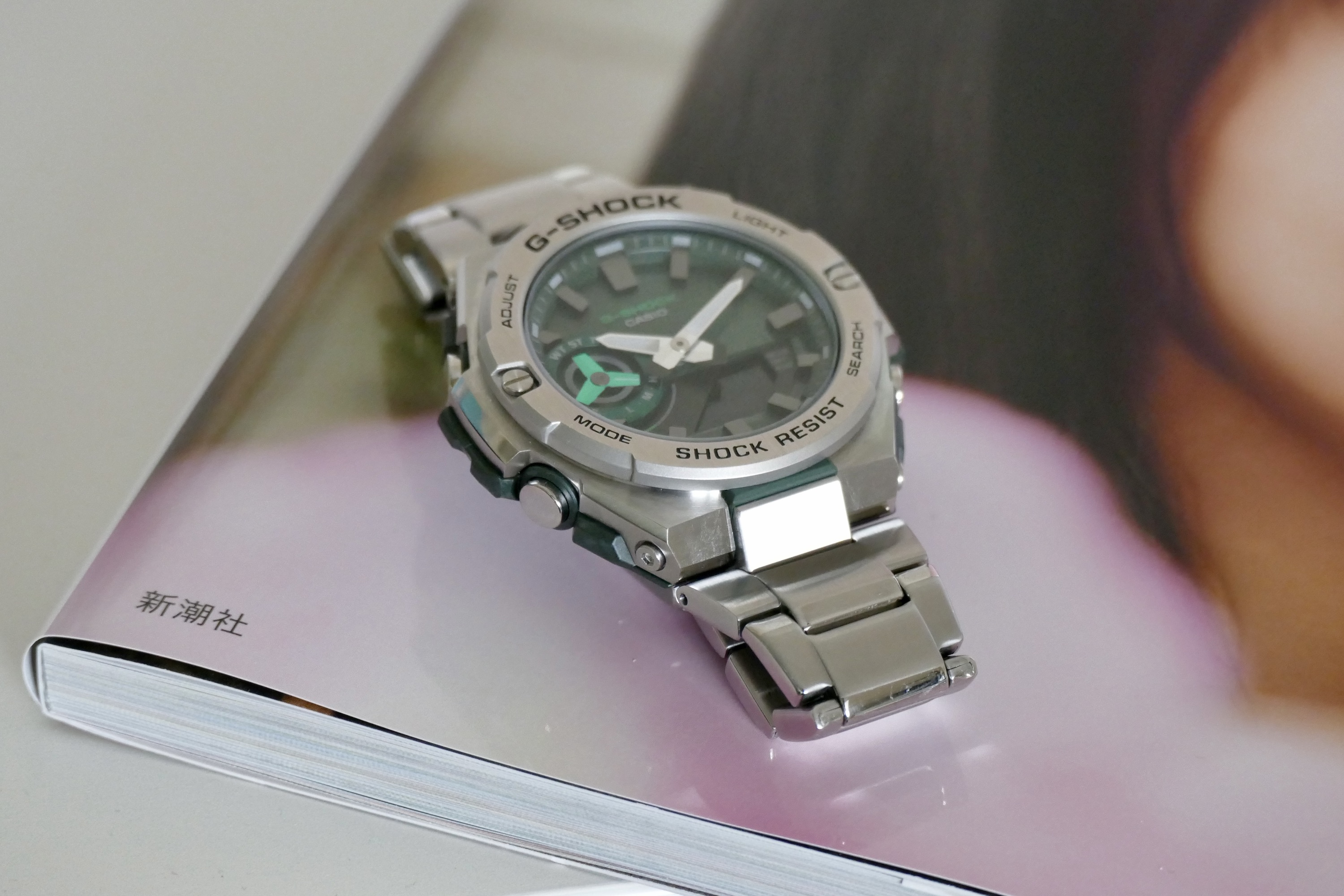Casio G-Shock GST-B500 showing the green dial and bracelet.