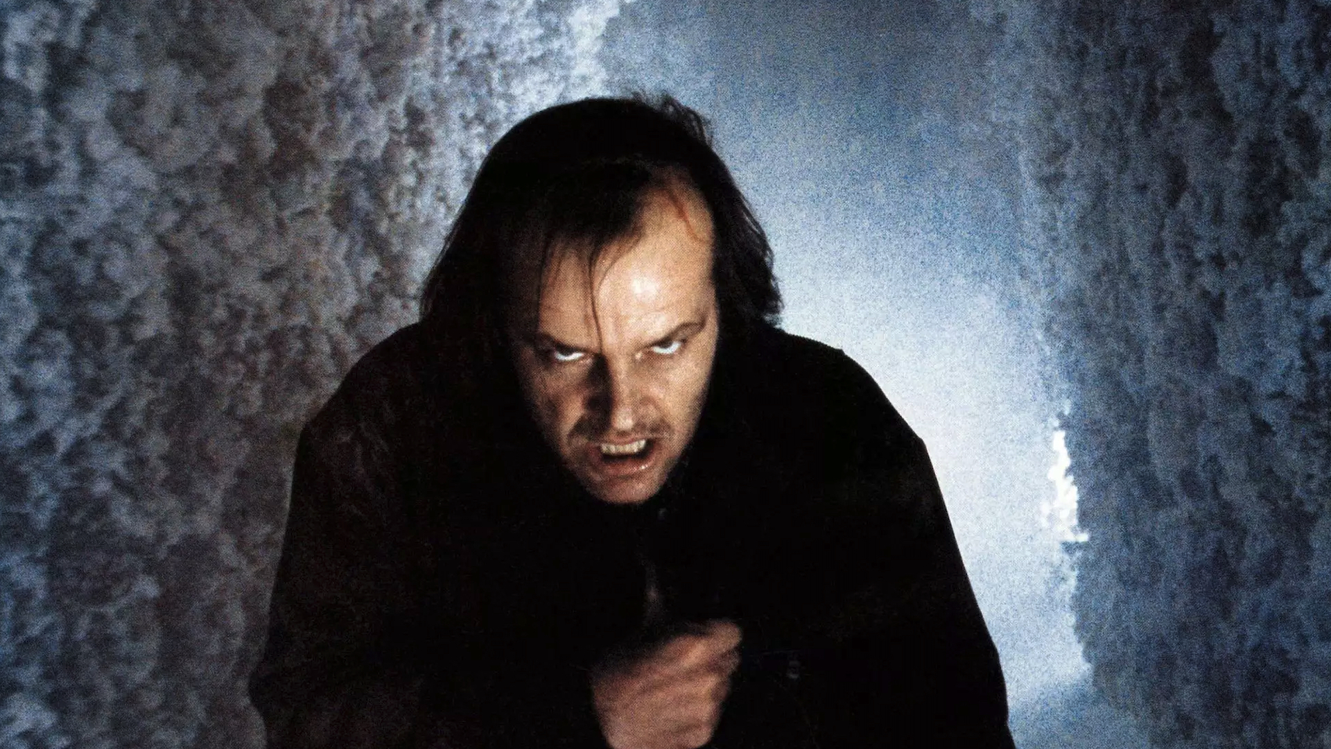 Jack Nicholson olha para a câmera em O Iluminado.
