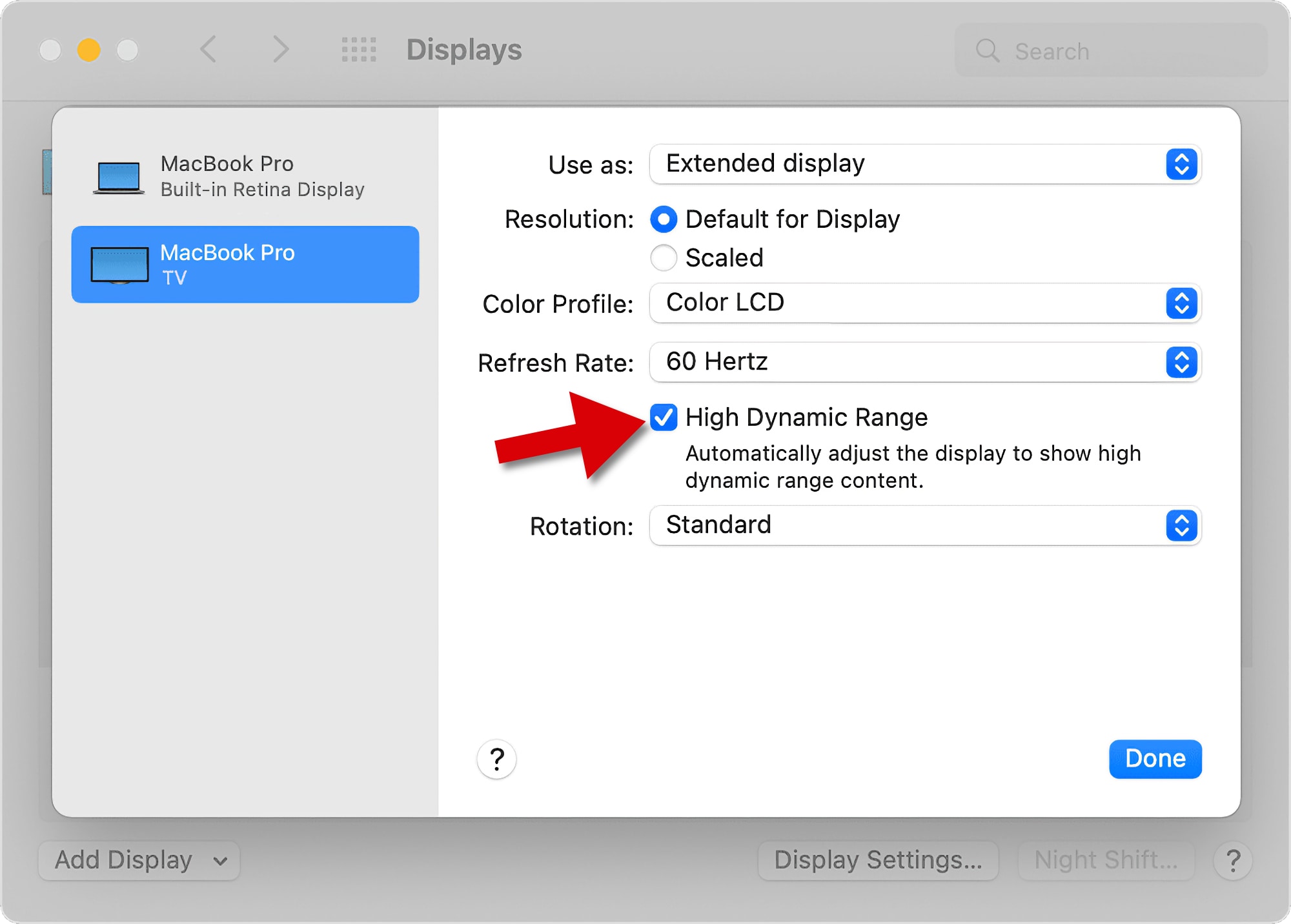Use as preferências do sistema MacOS para ativar o HDR em um monitor externo.