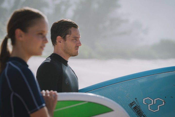 Laura and Harrison surf in Press Play.