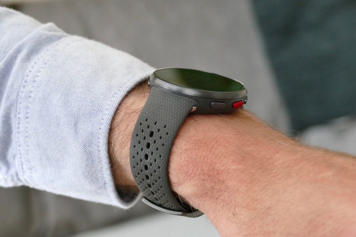 Polar Pacer Pro on the man's wrist as seen from the side.