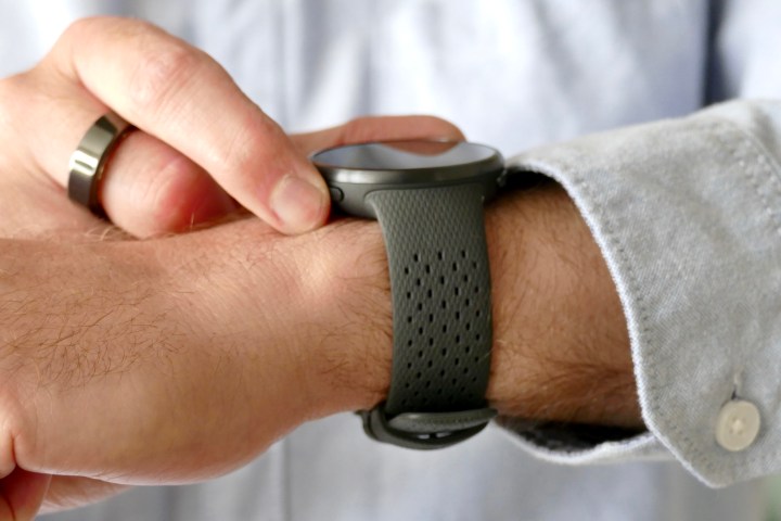 The Polar Pacer Pro being used, worn on a man's wrist.