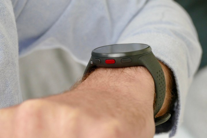 A button that appears on the Polar Pacer Pro and is worn on a man's wrist.
