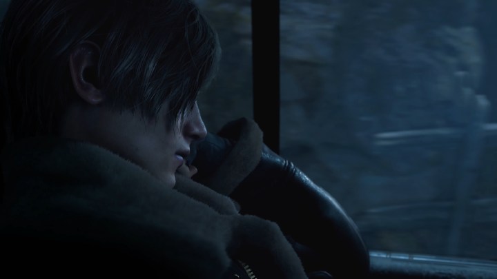 Leon Kennedy in vehicle in the Resident Evil 4 remake.