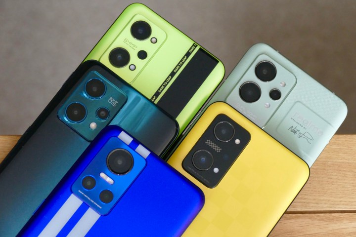The camera modules on several Realme smartphones, seen from the back.