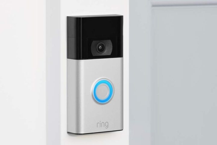 Ring Video Doorbell installed next to a white front door.