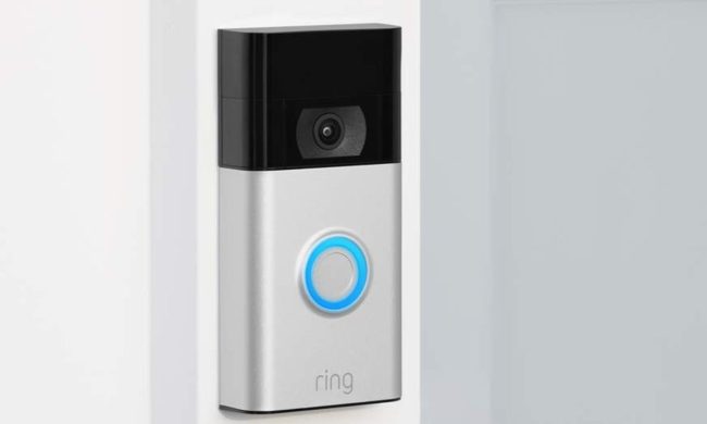 Ring Video Doorbell installed next to a white entry door.