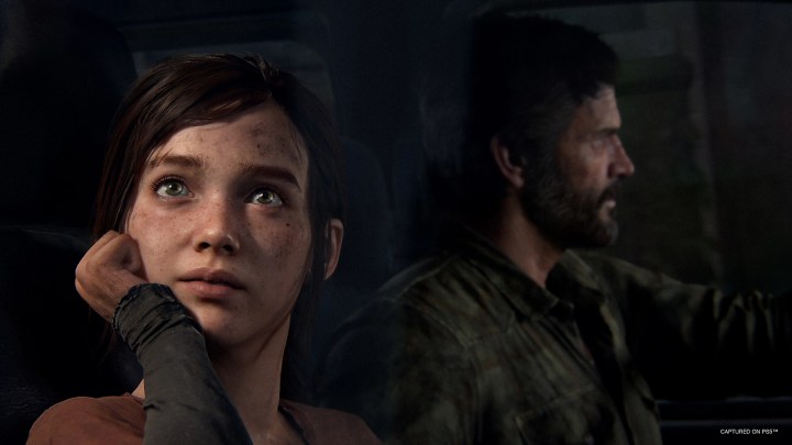 Ellie looks out a car window while Joel drives.