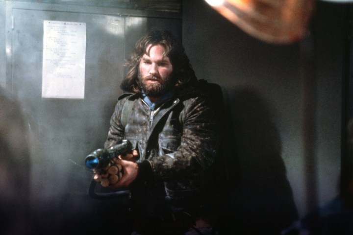 A man holding a flamethrower from the movie The Thing